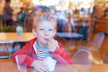 Image showing kid eating ice cream