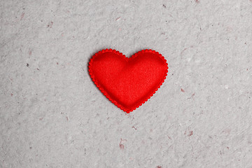 Image showing red heart on vintage  paper background