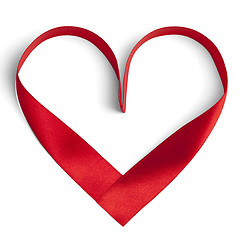 Image showing Red ribbon in a heart shape isolated on white