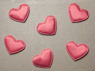 Image showing red hearts on vintage  paper background