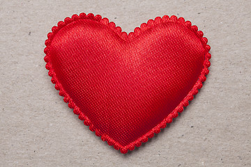 Image showing red heart on vintage  paper background