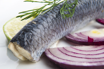 Image showing Fillet herring with onion and lemon