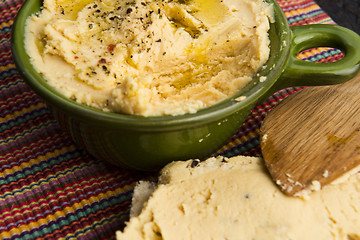 Image showing A bowl of creamy hummus
