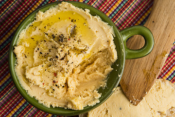 Image showing A bowl of creamy hummus