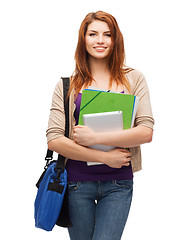 Image showing smiling student with bag, folders and tablet pc