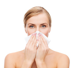 Image showing beautiful woman with paper tissue