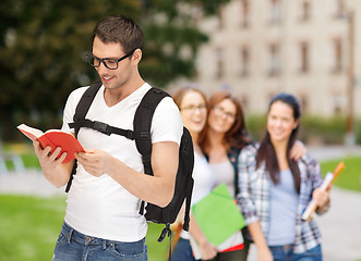 Image showing travelling student with backpack and book