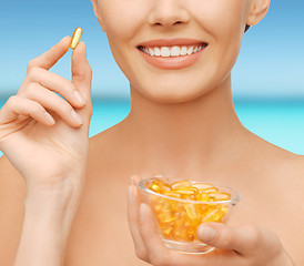 Image showing beautiful woman with omega 3 vitamins