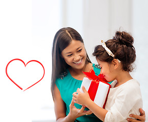 Image showing happy mother and child girl with gift box