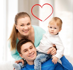 Image showing happy parents playing with adorable baby