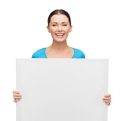 Image showing smiling girl with white blank board