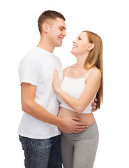 Image showing happy young family expecting child