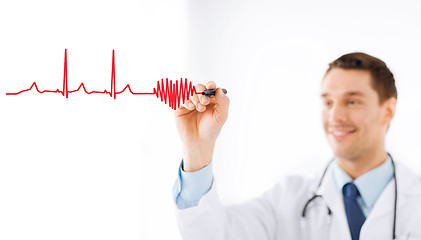 Image showing male doctor drawing heart in the air