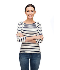 Image showing smiling girl in casual clother with crossed arms