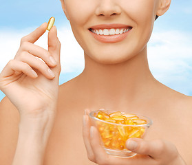 Image showing beautiful woman with omega 3 vitamins