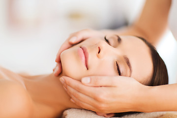 Image showing beautiful woman in spa salon having facial