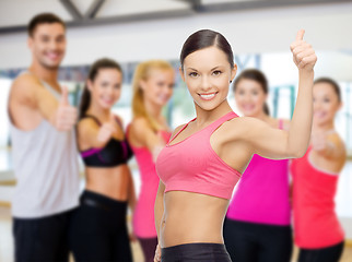 Image showing personal trainer with group in gym