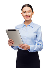 Image showing smiling businesswoman with tablet computer