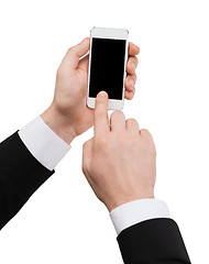 Image showing businessman touching screen of smartphone