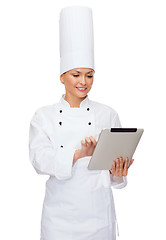 Image showing smiling female chef with tablet pc computer