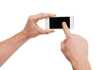 Image showing closeup of man hands touching screen of smartphone