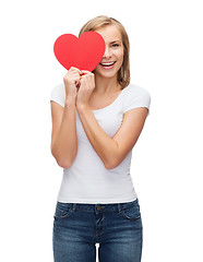 Image showing smiling woman in blank white t-shirt with heart