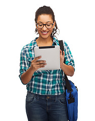 Image showing student in eyeglasses with tablet pc and bag