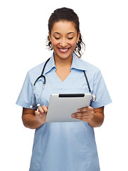 Image showing doctor or nurse with stethoscope and tablet pc