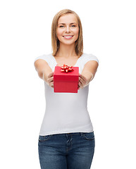 Image showing smiling girl with gift box