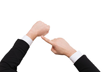 Image showing businessman pointing to something at his hand