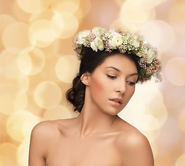 Image showing beautiful woman wearing wreath of flowers