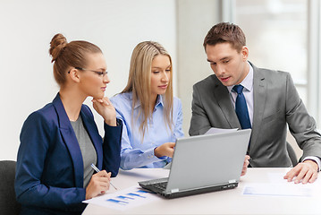 Image showing business team with laptop having discussion