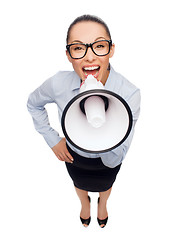 Image showing screaming businesswoman with megaphone