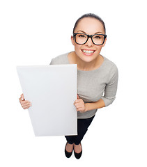 Image showing asian woman in eyeglasses with white blank board