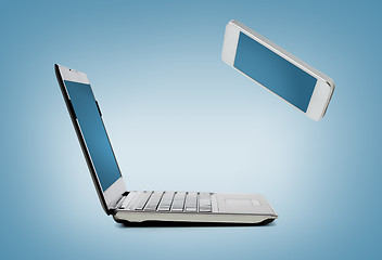 Image showing smartphone and laptop conncecting