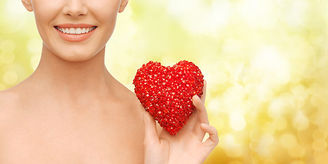 Image showing beautiful woman with red heart