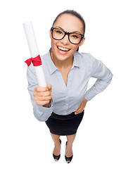 Image showing smiling businesswoman in eyeglasses with diploma