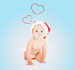 Image showing cute baby in santa helper hat