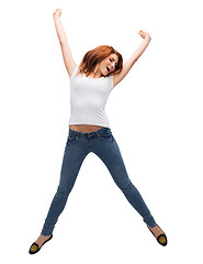 Image showing teenage girl in white blank t-shirt jumping