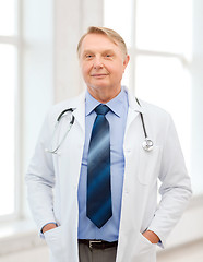 Image showing smiling doctor or professor with stethoscope