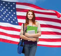 Image showing smiling student with bag, folders and tablet