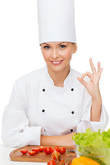 Image showing female chef with vagetables showing ok sign