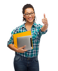 Image showing student in eyeglasses with folders and tablet pc