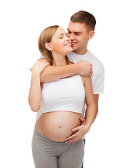 Image showing happy young family expecting child