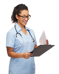 Image showing smiling female african american doctor or nurse