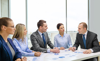 Image showing smiling business team at meeting