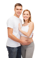 Image showing happy young family expecting child