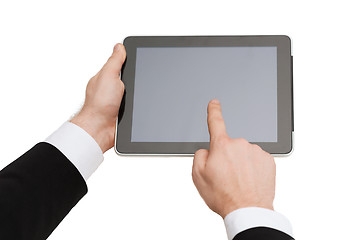 Image showing close up of man hands touching tablet pc