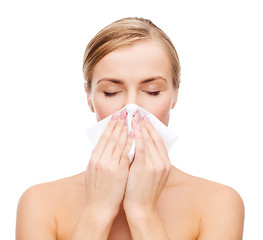 Image showing beautiful woman with paper tissue