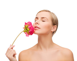 Image showing lovely woman with peonie flower